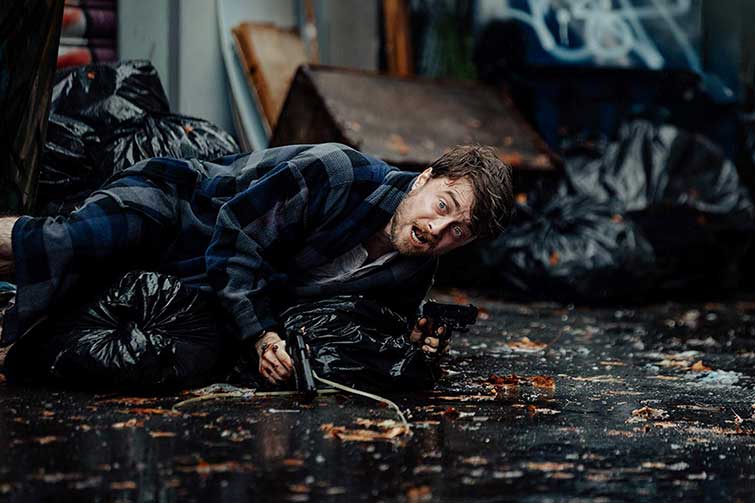 Daniel Radcliffe on Set - Guns Akimbo Daniel Radcliffe on Set - Guns Akimbo